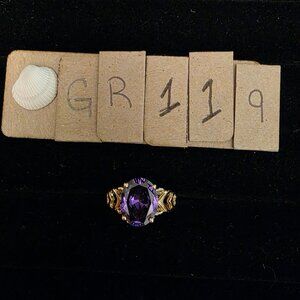 Item # GR119  10K Gold DQZ Purple Oval ring size 8.5